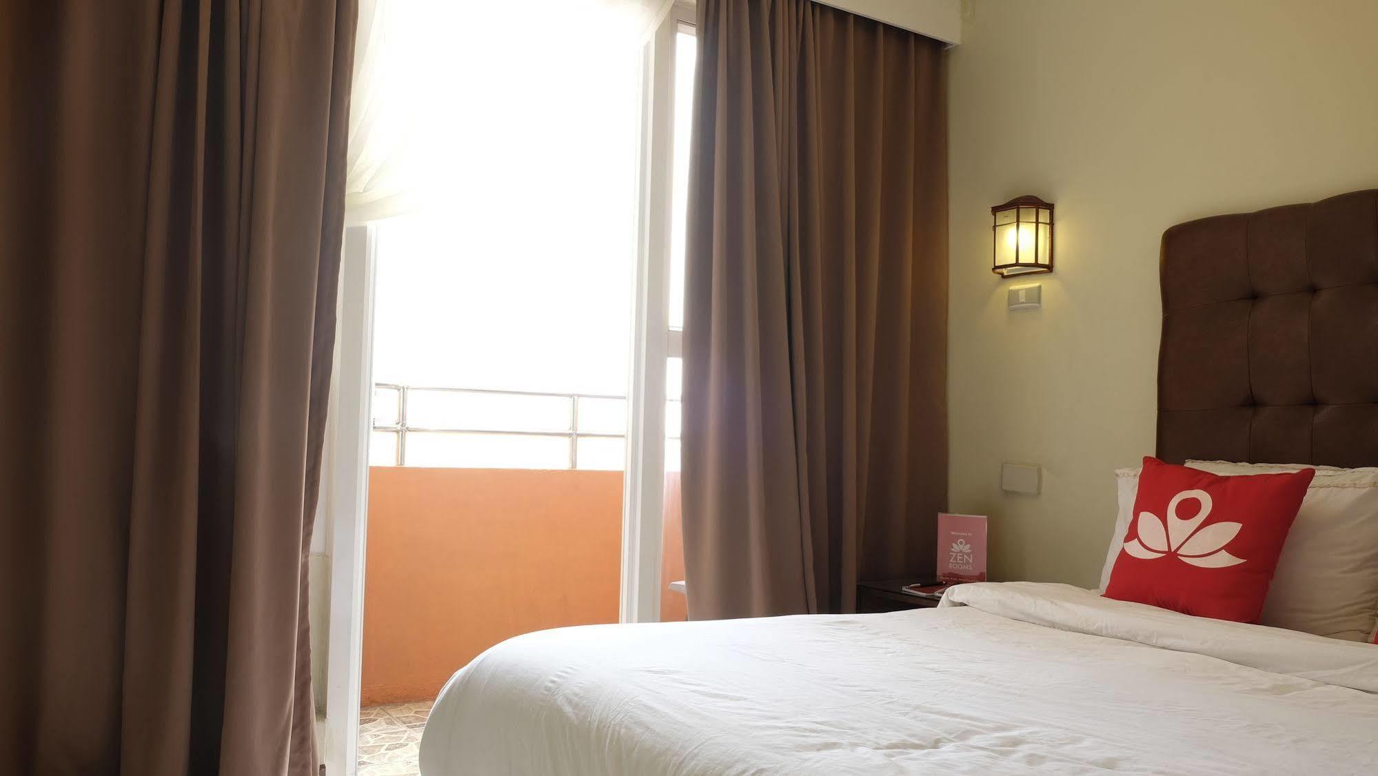 Zen Rooms Malate Robinsons Манила Экстерьер фото