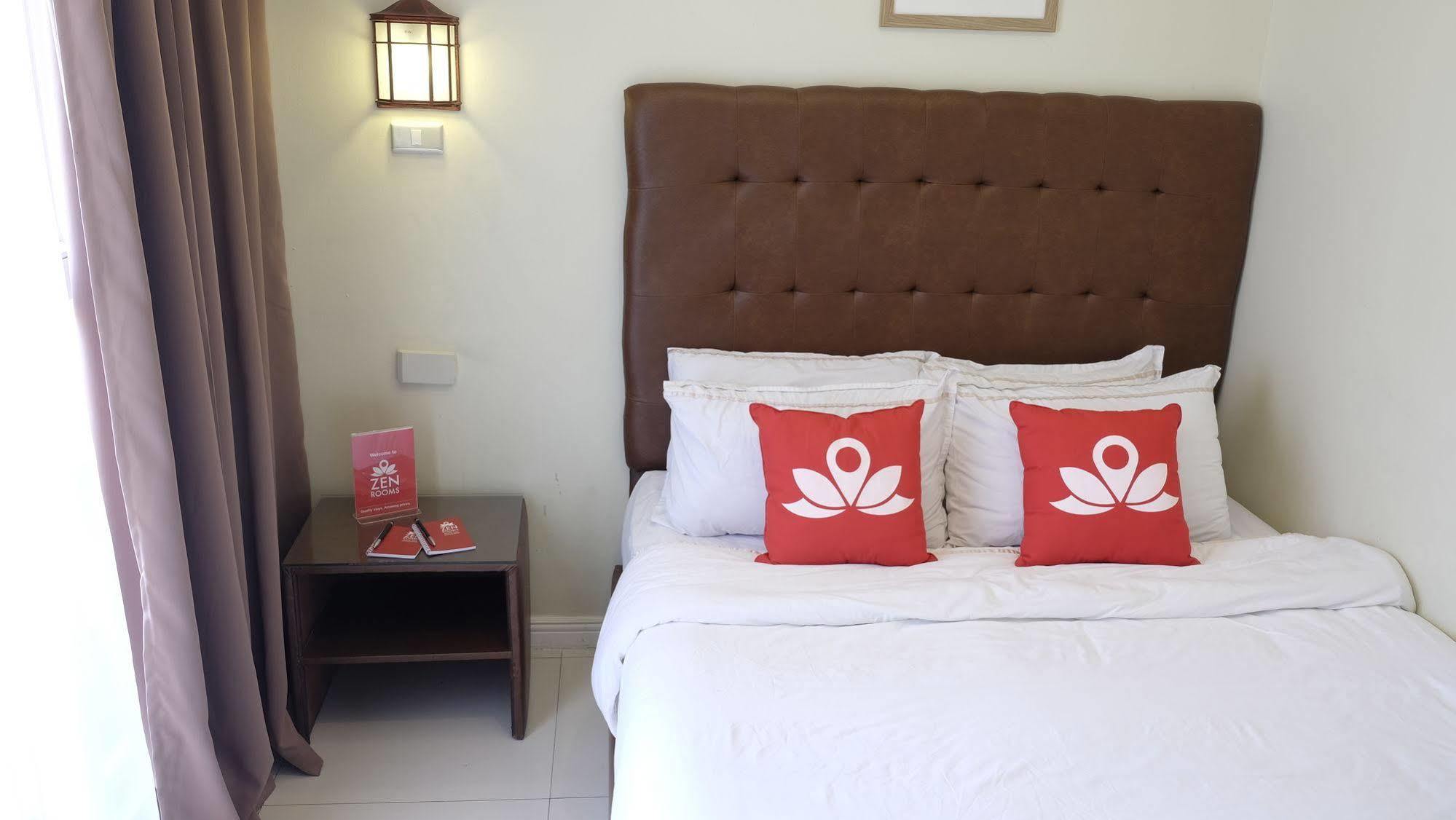 Zen Rooms Malate Robinsons Манила Экстерьер фото