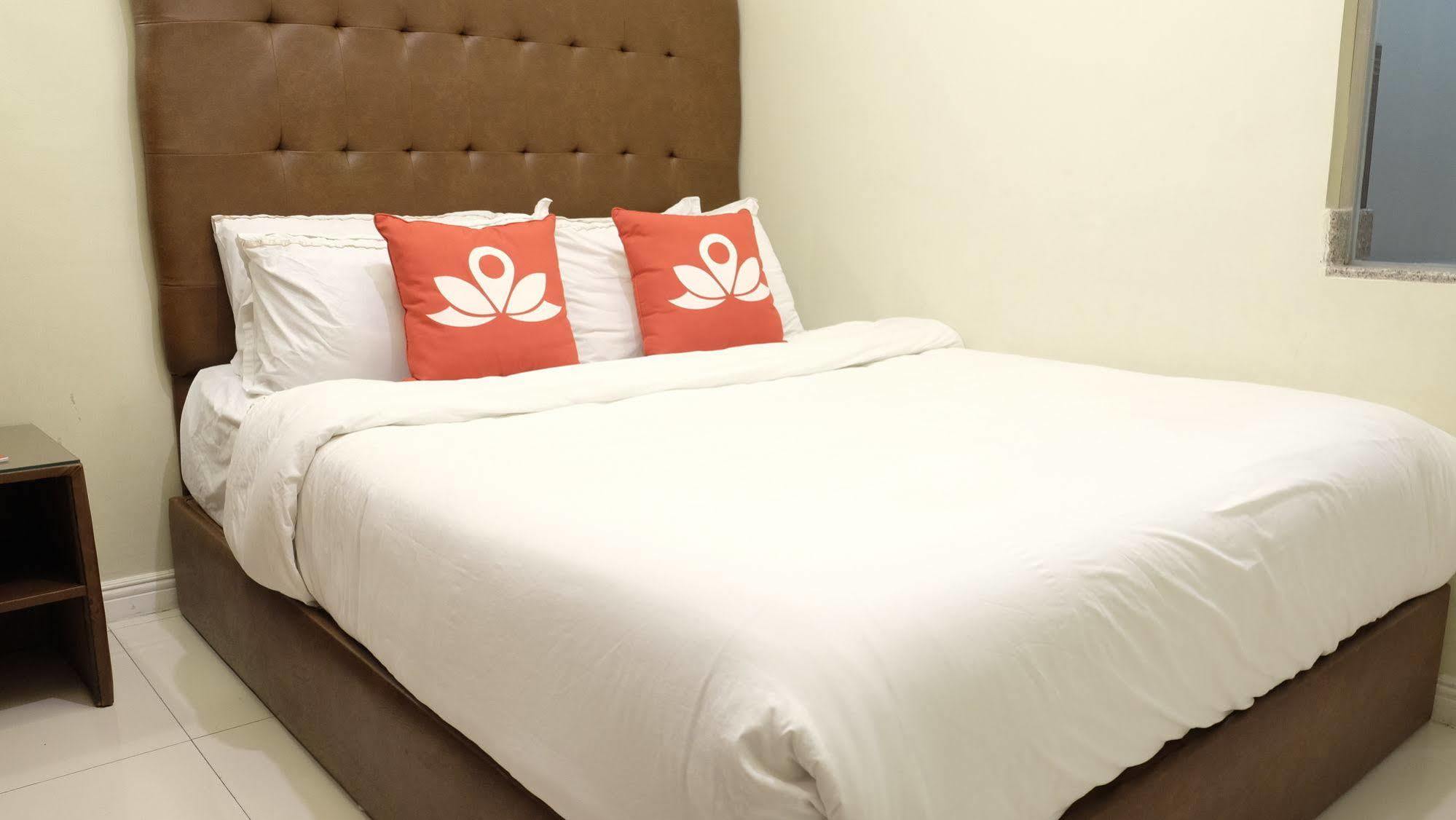 Zen Rooms Malate Robinsons Манила Экстерьер фото